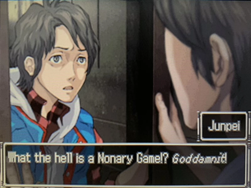 We were all thinking it. Man looking in the mirror. He asks “What the hell is a Nonary Game!? Goddamnit!”