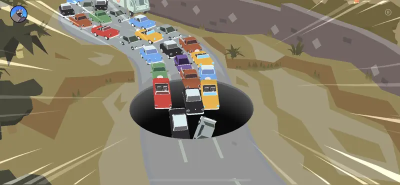 Cars drive off of a backed up highway and into a massive hole.