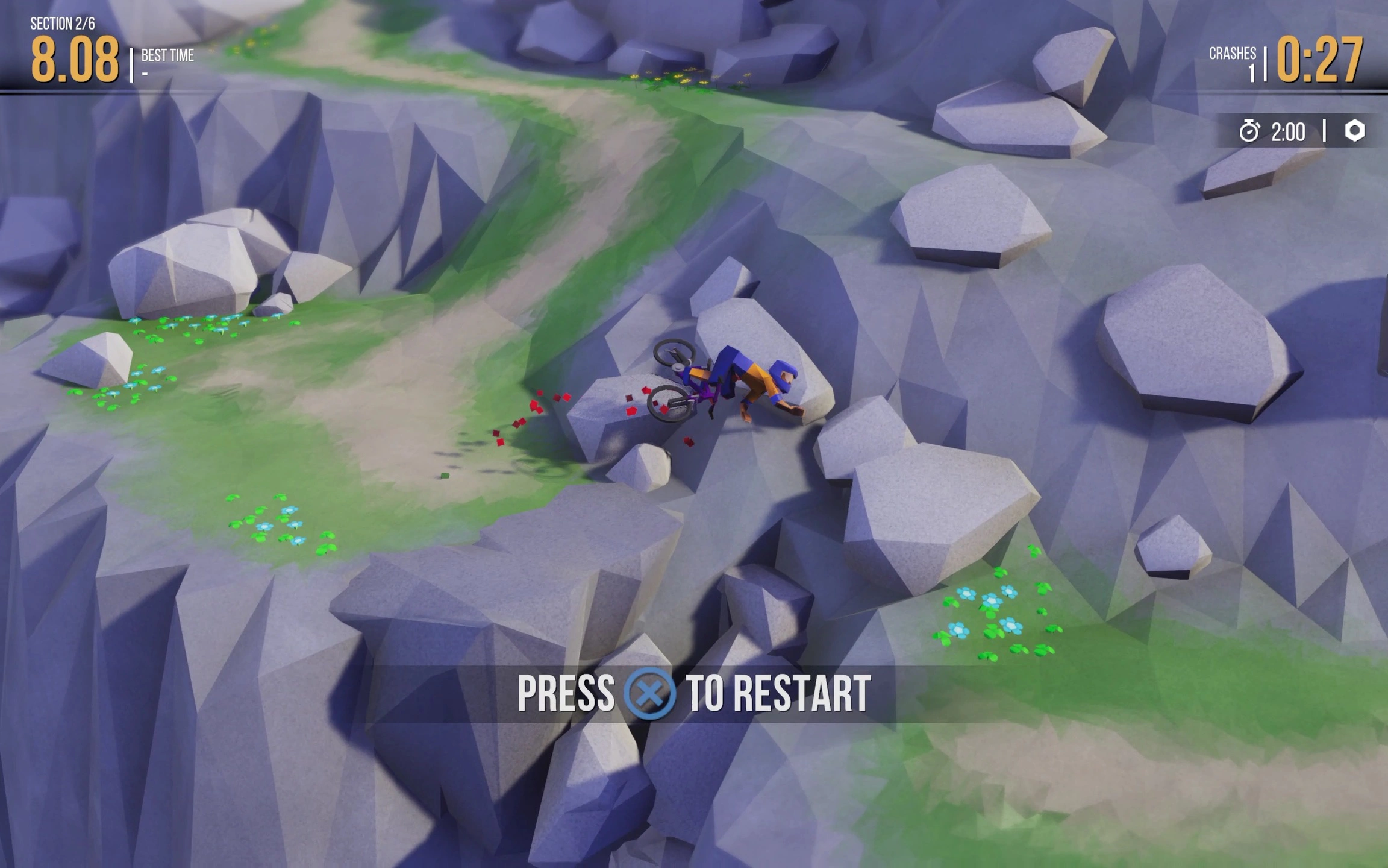 A player and bike being thrown into the rocks with red voxels spilling everywhere.